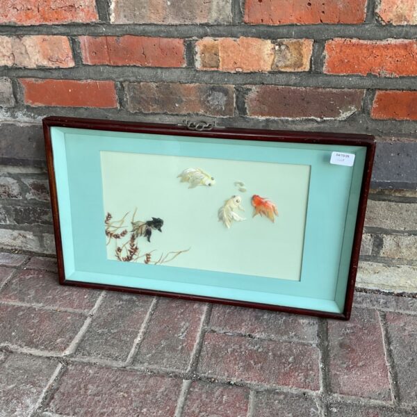 Framed mother of pearl artwork depicting colourful goldfish.