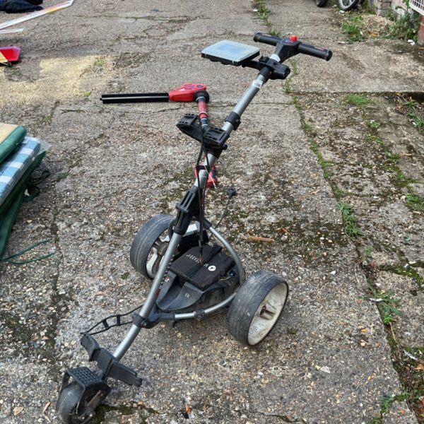 Used Motocaddy S1 electric golf trolley in outdoor setting.