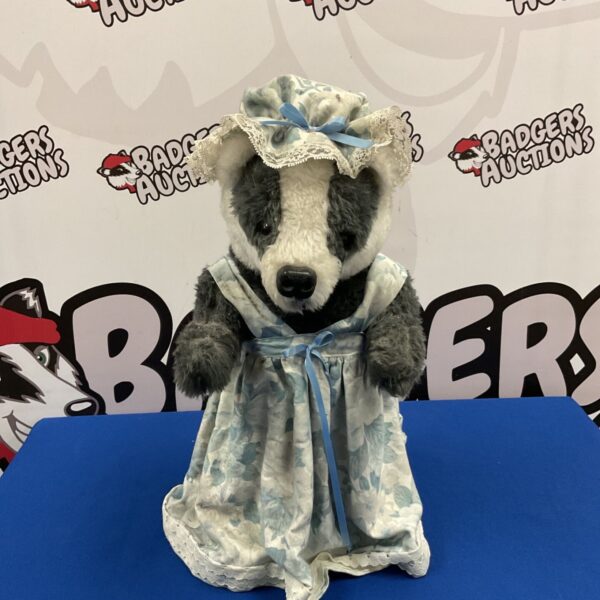 Mrs Badger weighted fabric doorstop in blue floral dress and bonnet