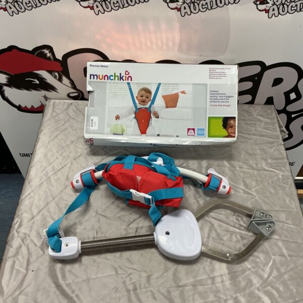Munchkin Bounce About baby bouncer with red harness and turquoise straps