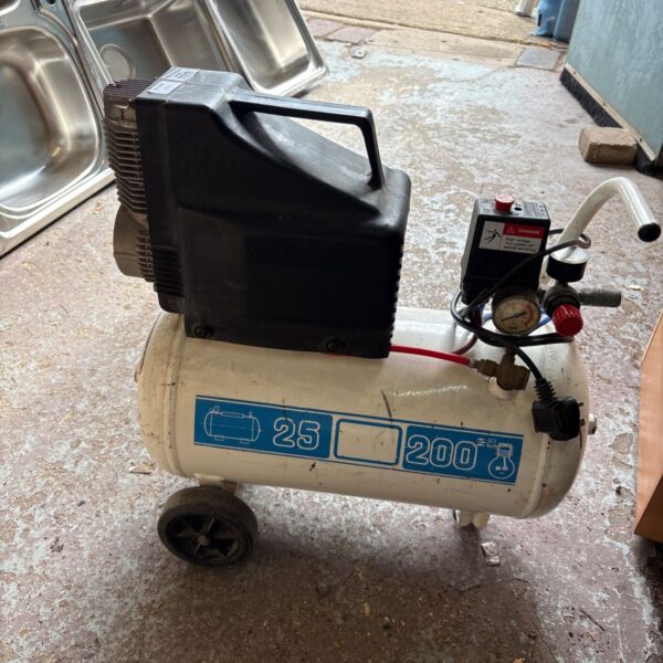Nardi portable air compressor in used condition, ideal for workshop use.