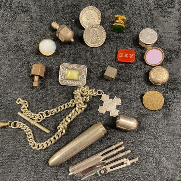 Vintage Nelson coins, fob chain, cufflinks and assorted collectables in a mixed lot