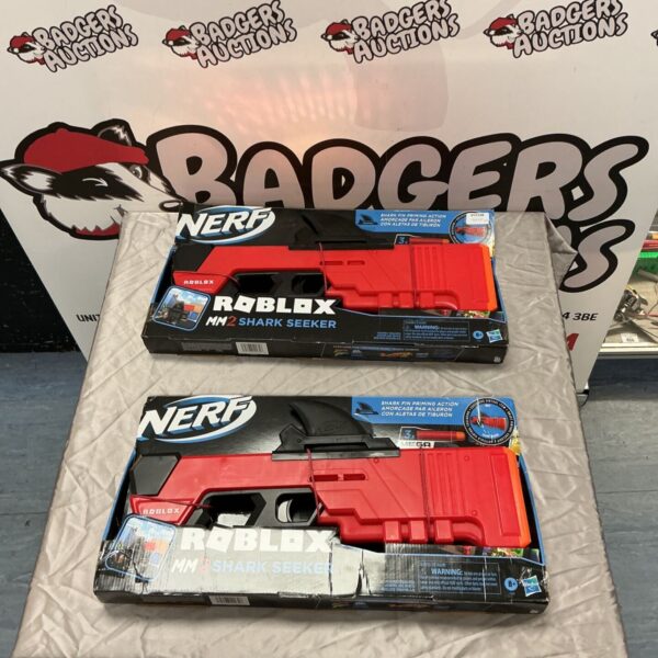 Two boxed Nerf Roblox MM2 Shark Seeker toy blasters in red packaging