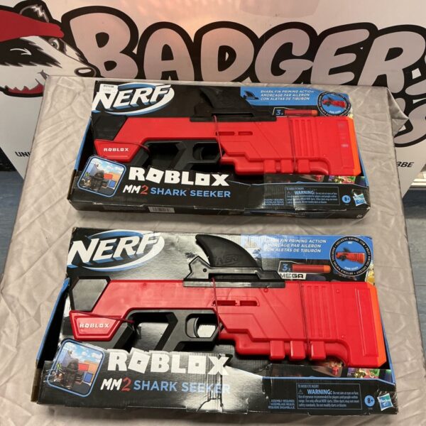 Two boxed Nerf Roblox MM2 Shark Seeker toy guns with red blasters