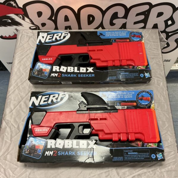 Two boxed Nerf Roblox MM2 Shark Seeker toy blasters in red and black