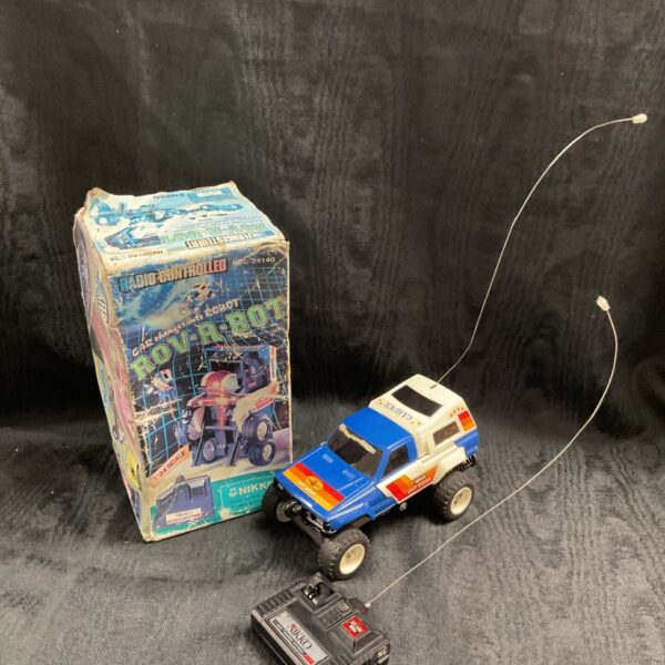 Vintage Nikko Rov-A-Bot Hilux radio controlled car with original box.