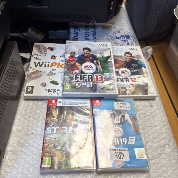 Nintendo video game lot including FIFA titles for Wii and Switch.