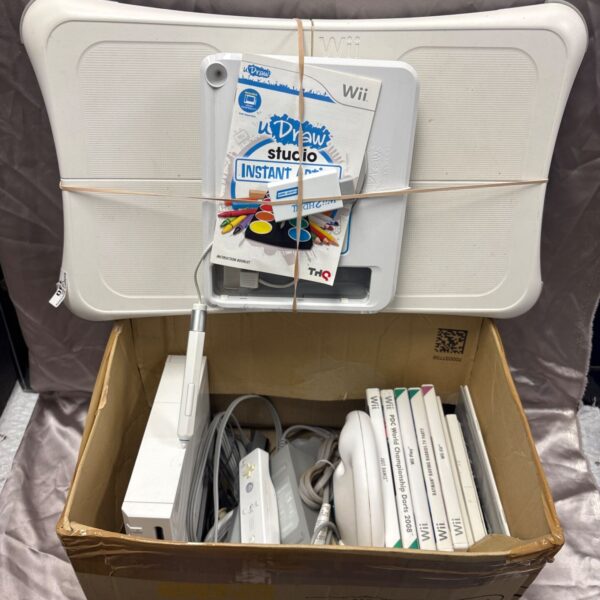 Nintendo Wii console bundle with games and accessories.