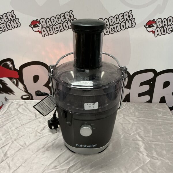 Dark grey Nutribullet juicer with chrome handle and clear feed chute