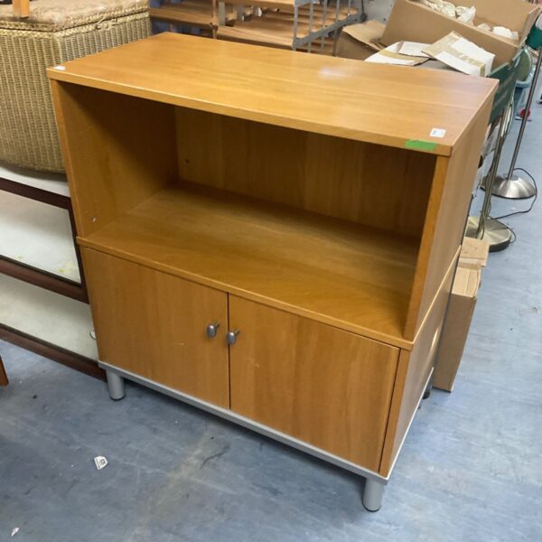 Oak effect cabinet with open upper shelf and two lower doors