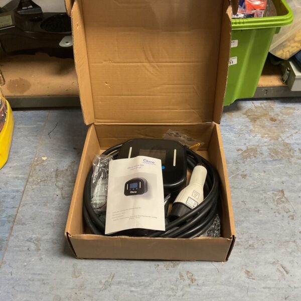 Ohme Home Pro 7.4kW Type 2 tethered EV charger in open cardboard box