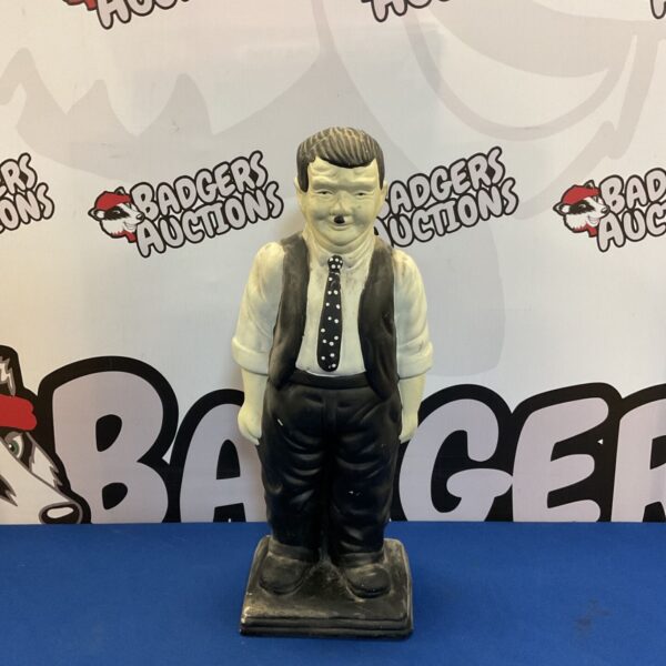Vintage Oliver Hardy ceramic figurine, a classic comedy collectible.