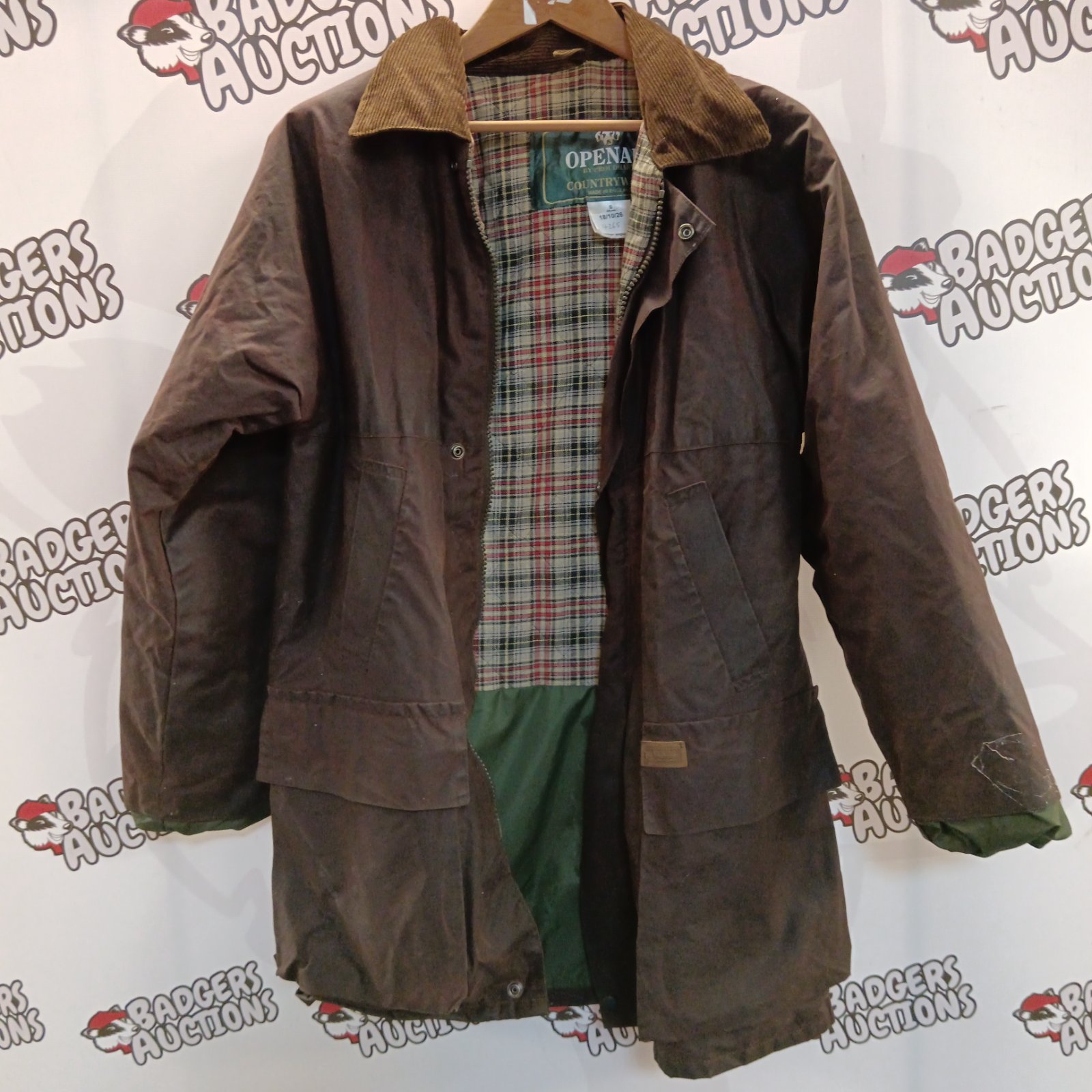 Small Openair Proudhart wax jacket with patterned lining.