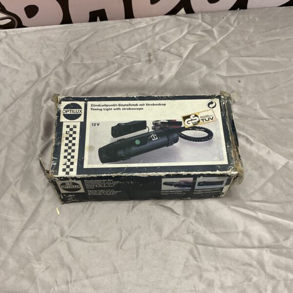 Optilux timing light with stroboscope in worn original box, 12V