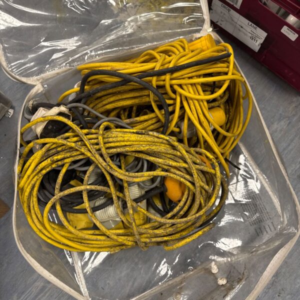 Bundle of orange extension lead cables for DIY projects.