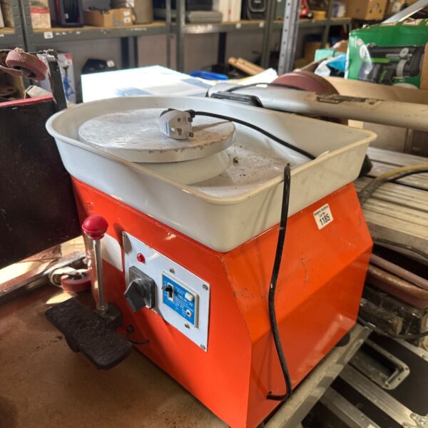 Orange electric pottery wheel, model Dzl18-32, for ceramic art.