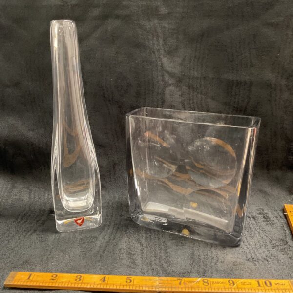 Two clear Swedish Orrefors crystal vases, one tall and slender, one rectangular