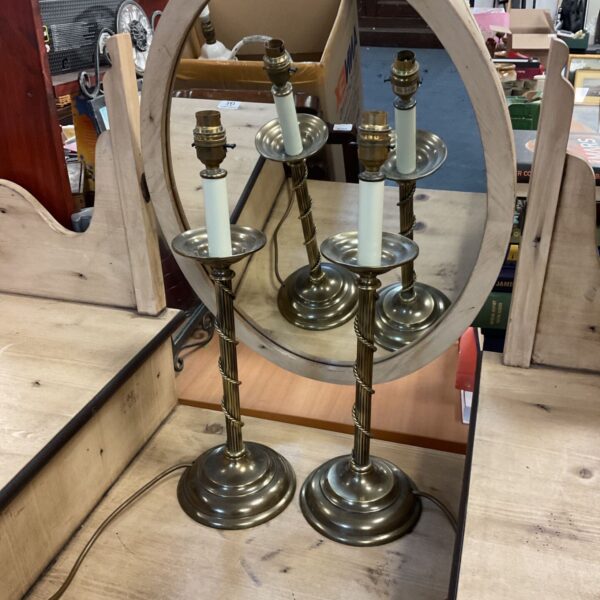 Pair of brass rope twist column table lamps with stepped circular bases