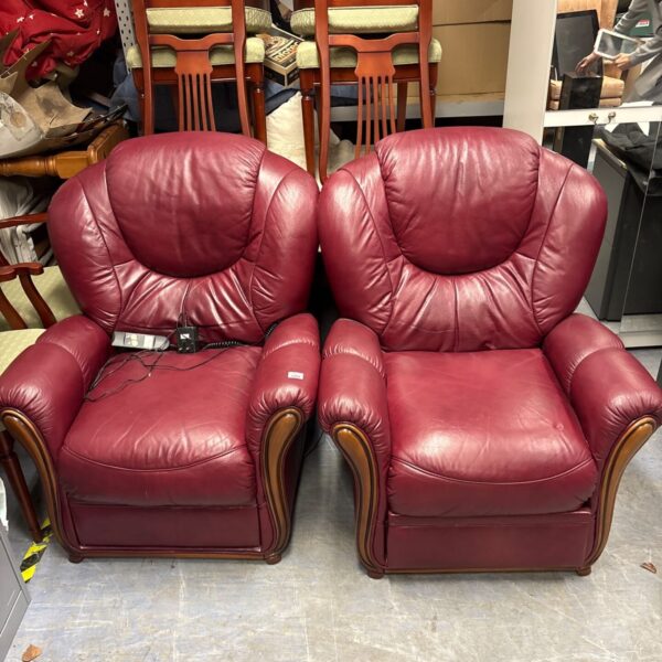 Pair of burgundy Italian leather armchairs with wooden side trim