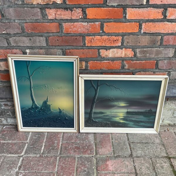 Pair of framed Halloween witch spooky artworks with textured teal landscapes