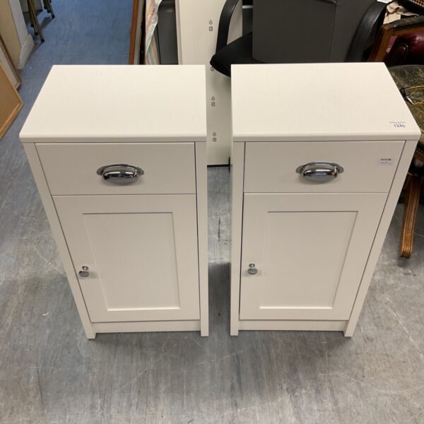 Pair of cream bedside cabinets with drawers, cupboards and chrome handles