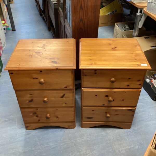 Pair of pine three drawer bedside tables with turned knobs
