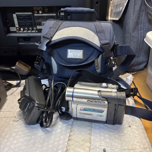 Panasonic DS60 camcorder in Antler case, vintage miniDV camera.