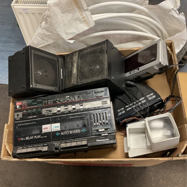 Panasonic RX-CW43 boombox with speakers and radios in a cardboard box