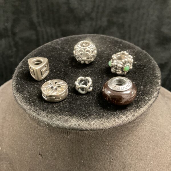 Pandora silver bead charms lot, including a rare wood charm.
