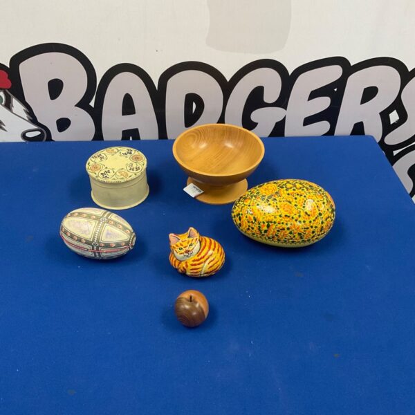 Vintage paper mache ornaments including a cat, egg, bowl and apple.