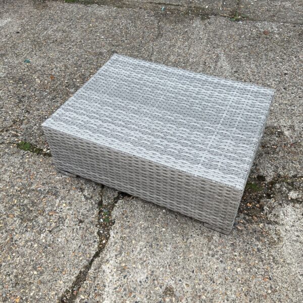 Woven patio table for outdoor use.