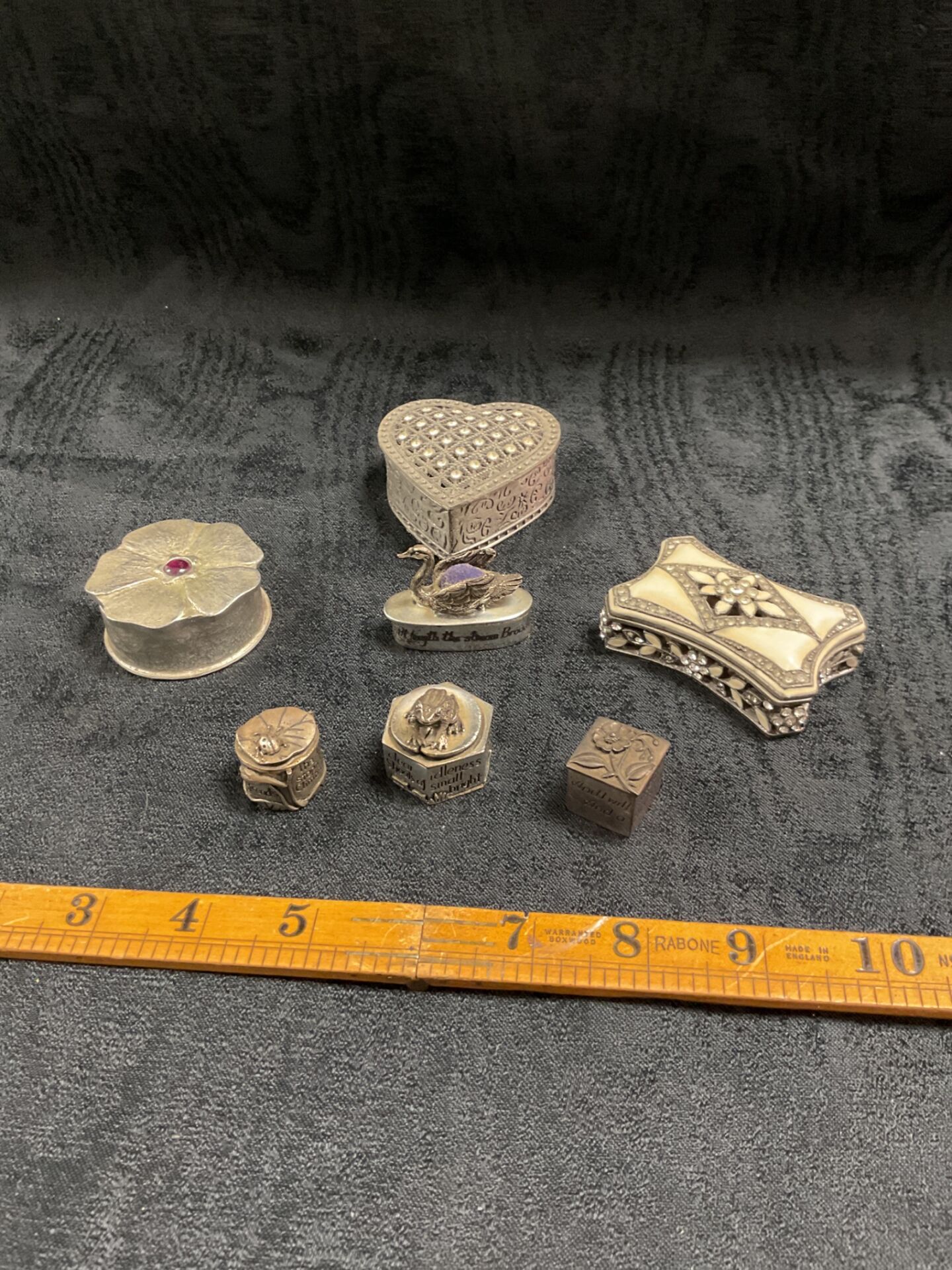 755 Seven pewter trinket boxes