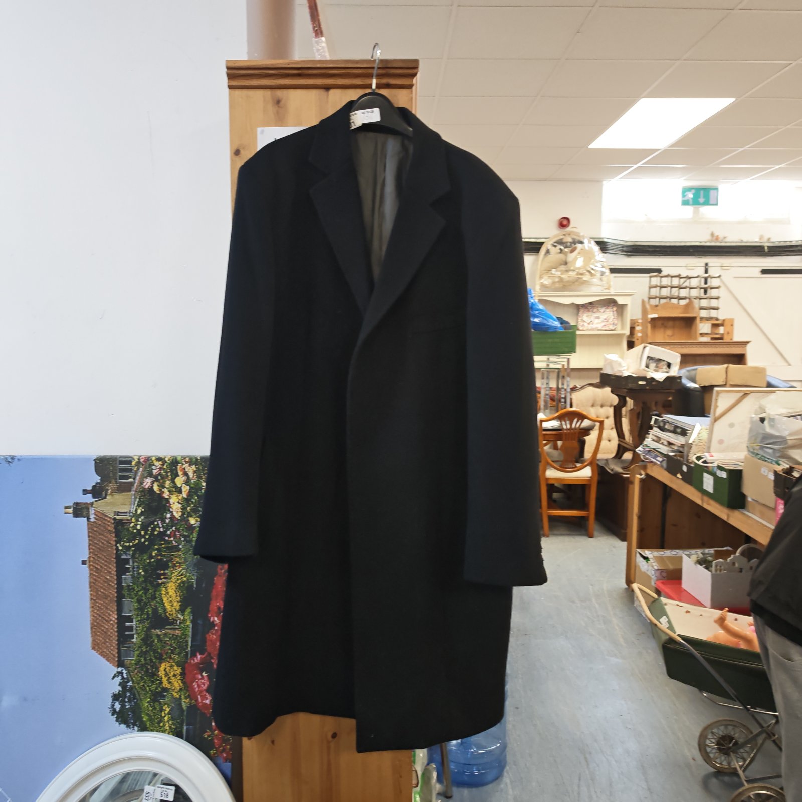 Black Pierre Cardin coat size M, a classic designer outerwear piece.