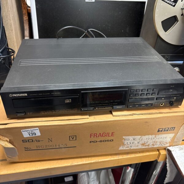 Black Pioneer PD-6050 compact disc player with original box beneath