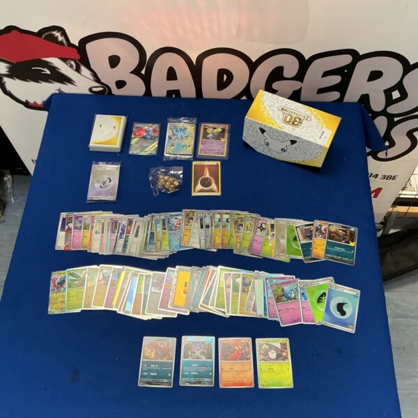Pokémon card collection with 30th Celebration box and sealed packs.
