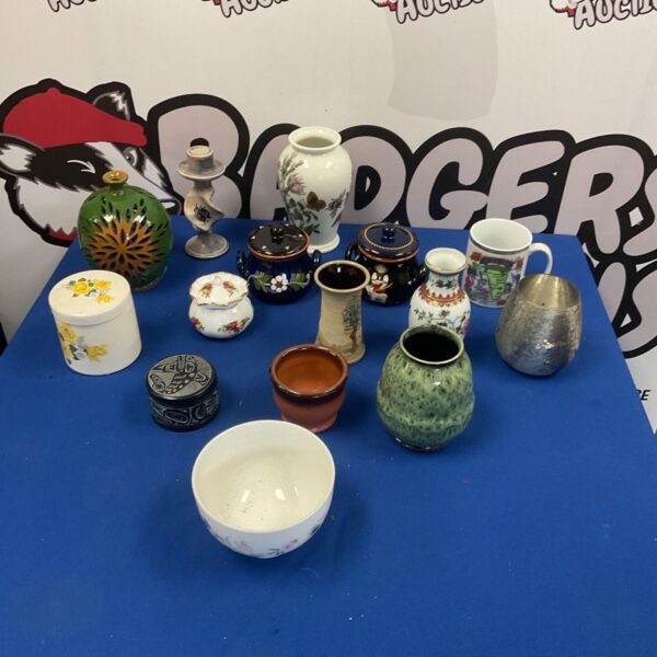 Mixed porcelain and pottery collection with a Portmeirion vase.