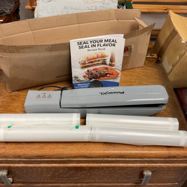 PowerXL Duo NutriSealer food sealer with sealing rolls and recipe book