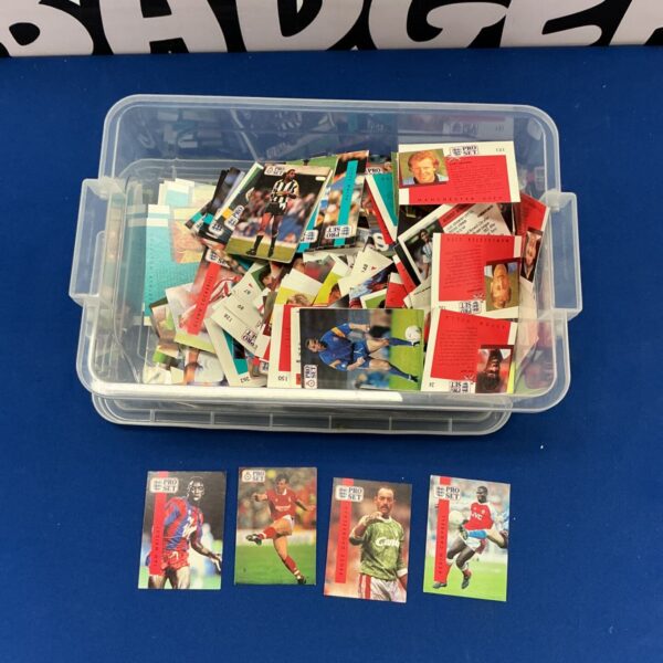 Vintage Pro Set football cards in a storage container.