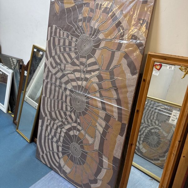 Large psychedelic canvas painting with swirling brown and cream patterns.