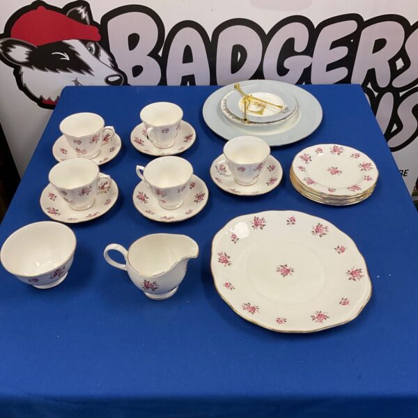 Vintage Queen Anne bone china tea set with floral design.