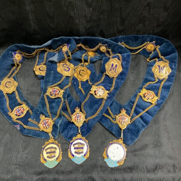 Group of vintage R.A.O.B ceremonial collars with blue velvet and gold embroidery.