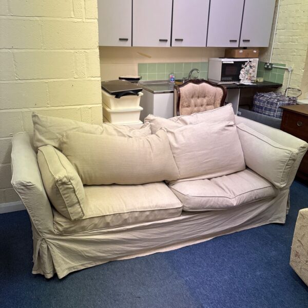 Radcliffe three seater sofa with cream linen covers and loose cushions