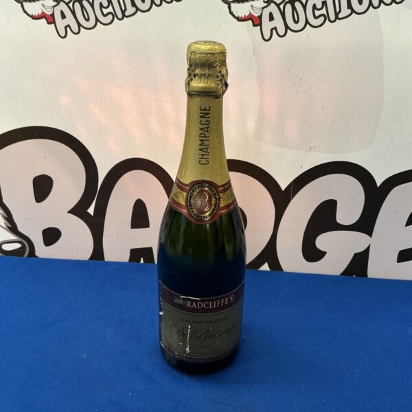 Bottle of Radcliffes De Brissar Champagne with vintage label.