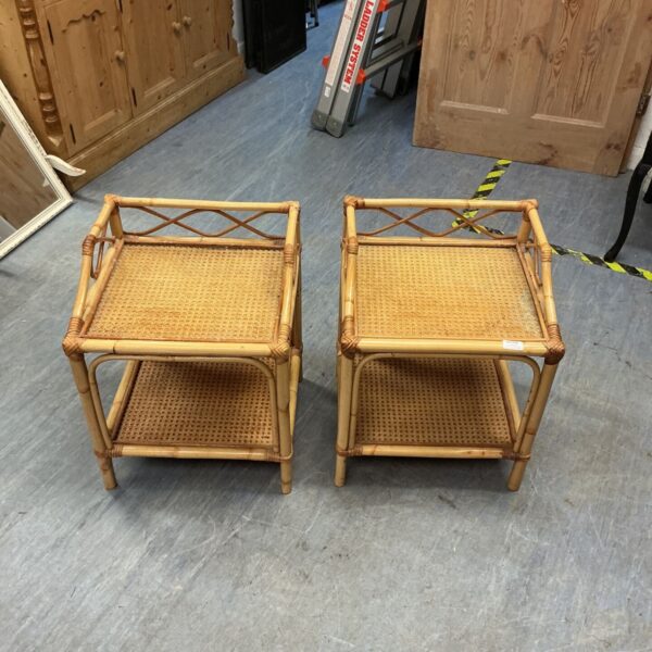 Pair of vintage rattan shelves with glass tops.