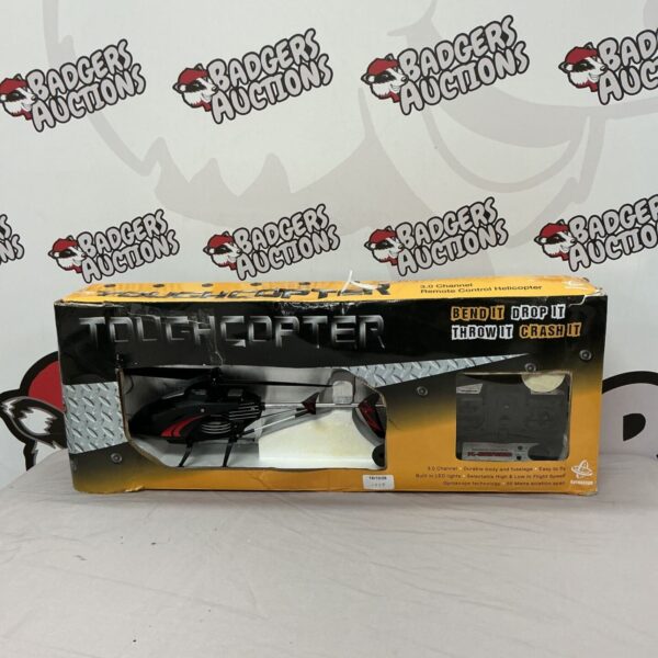 Red RC helicopter, ToughCopter model with remote control packaging.