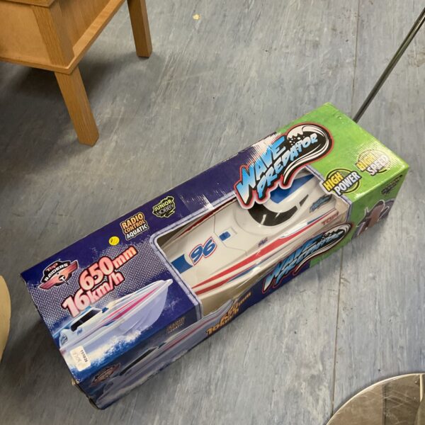 Used remote control Wave Predator speedboat, model 96, for sale.