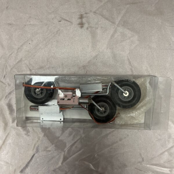 Retractable model plane undercarriage set with three wheels in clear plastic box