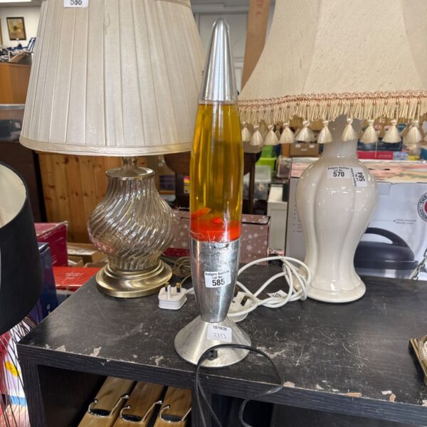 Vintage retro lava rocket lamp with a colourful glow.
