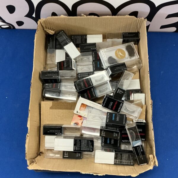 Quantity of Revlon false eyelashes in original packaging, vintage cosmetic lot.