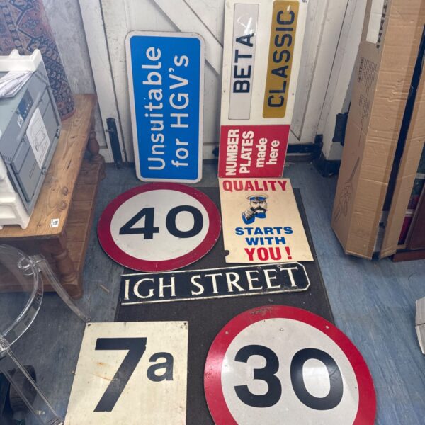 Vintage lot of road signs including a '40' sign.